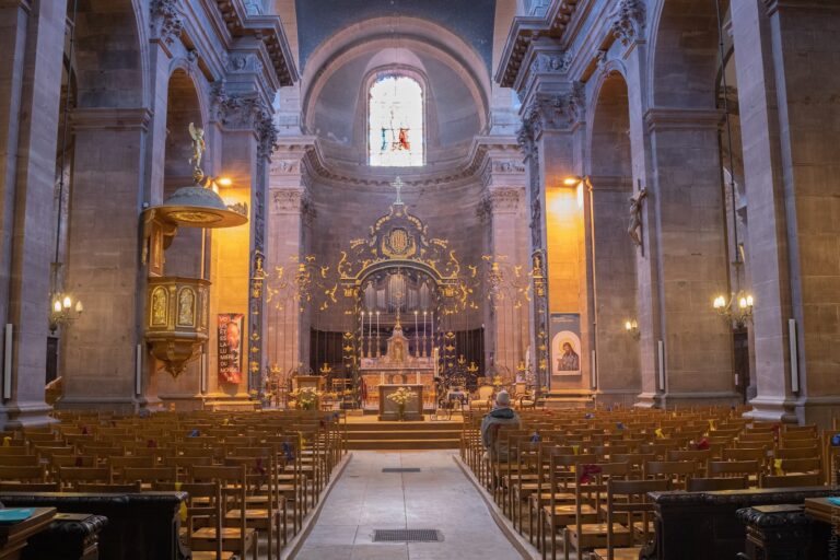 brown wooden chairs inside church