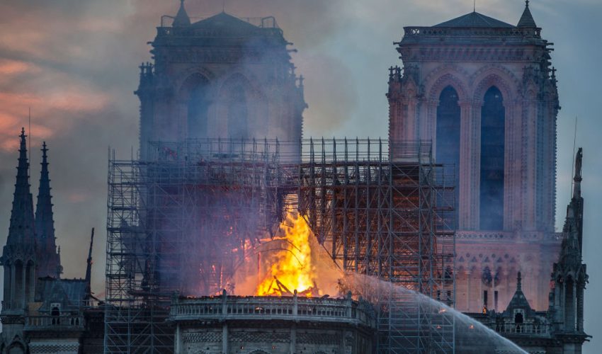 PARIS, FRANCE - APRIL 15: Smoke and flames rise from Notre-Dame Cathedral on April 15, 2019 in Paris, France. A fire broke out on Monday afternoon and quickly spread across the building, collapsing the spire. The cause is yet unknown but officials said it was possibly linked to ongoing renovation work. (Photo by Veronique de Viguerie/Getty Images)