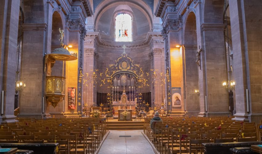 brown wooden chairs inside church